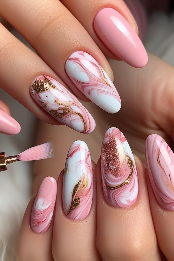 Pink and white marble nails with gold foil accents